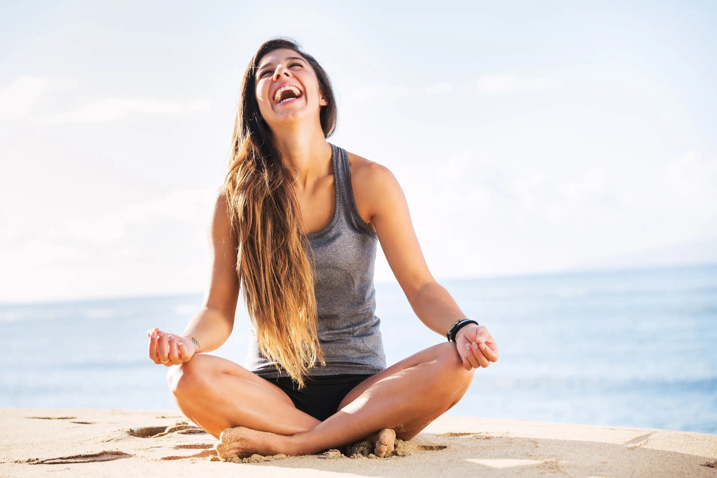 Young,Woman,Practicing,Morning,Meditation,In,Nature,At,The,Beach